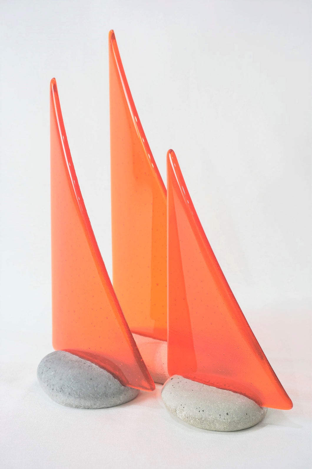 Orange fused glass pebble yacht boat